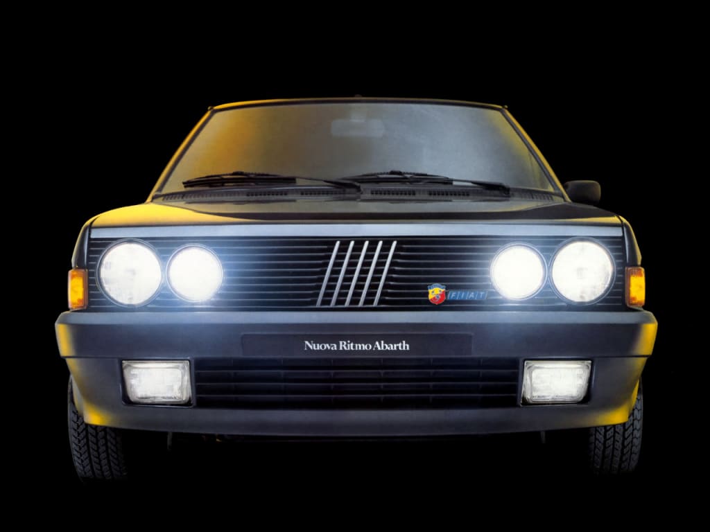 Ritmo 105 TC de face phares allumés