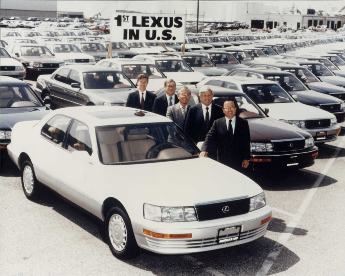 Toyota Executives Pose with the First Lexus Vehicle
