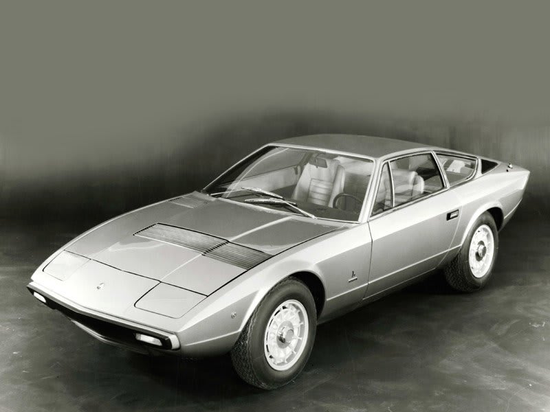Maserati Khamsin grise de trois quarts avant